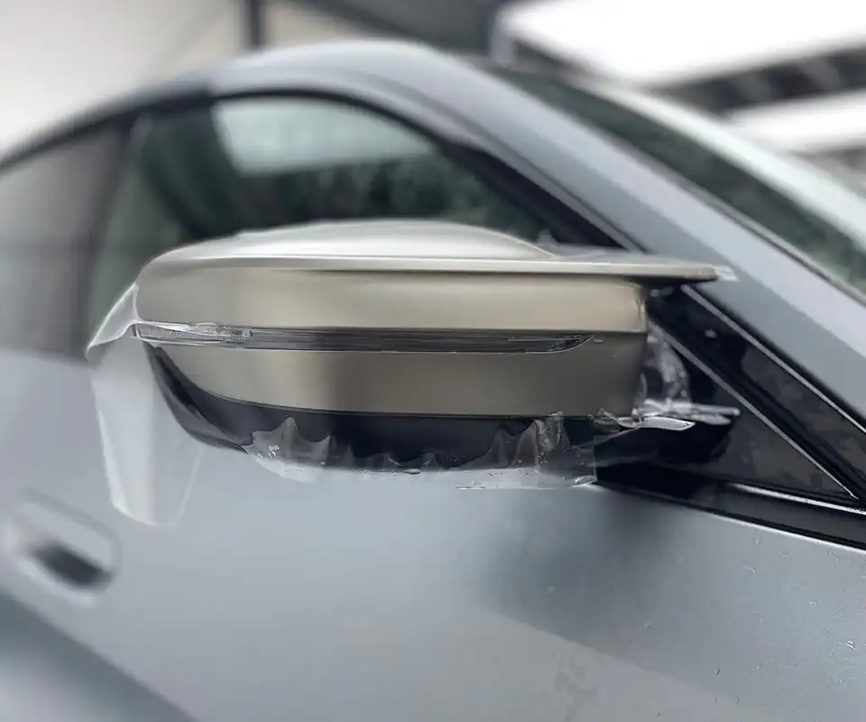PPF detail around a BMW i4 mirror
