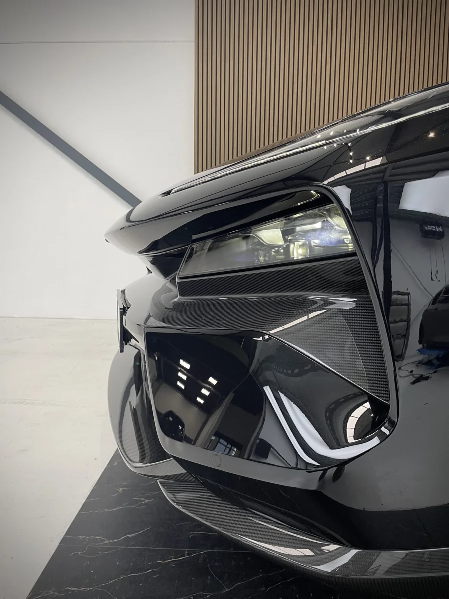 Reflections in the Lotus Eletre R's black paint after ceramic coating